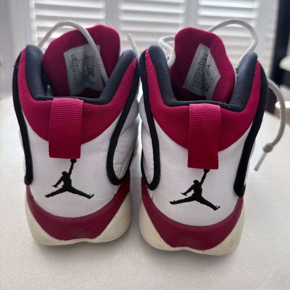 Nike Air Jordan Red and White High Tops
